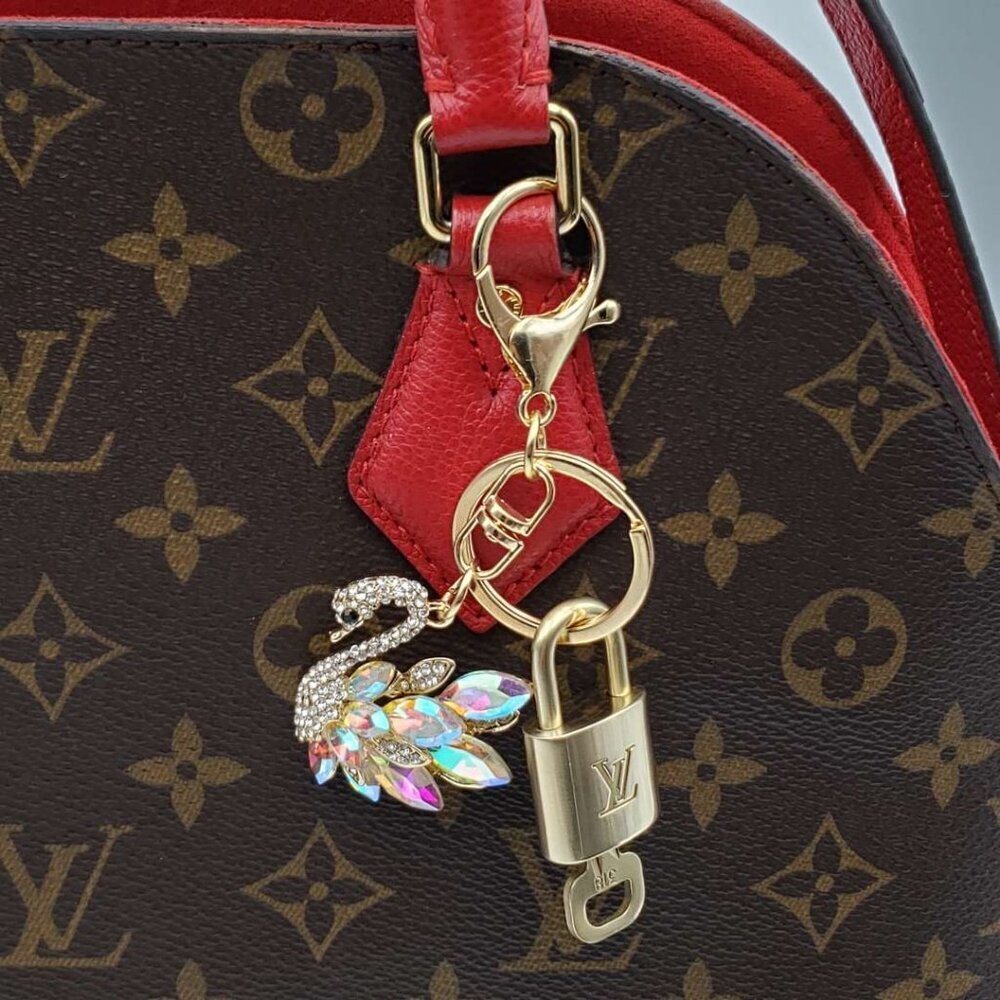 Authentic Louis Vuitton Gold Padlock & Key with Unbranded Swan Keychain - Picture 8 of 8